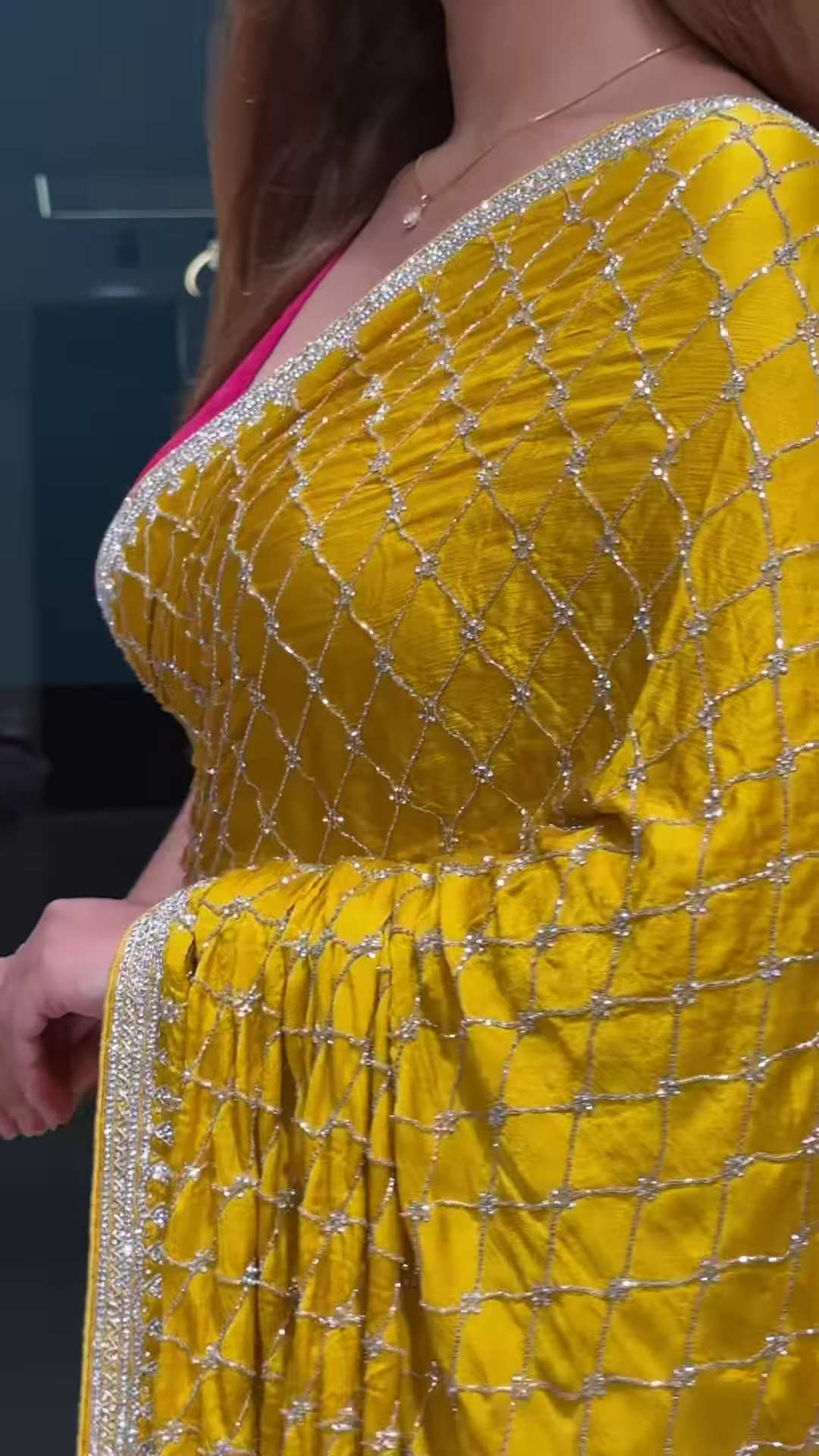 Radiant Yellow Georgette Saree with All-Over Sequin Lattice Pattern and Ornate Silver Zari Border