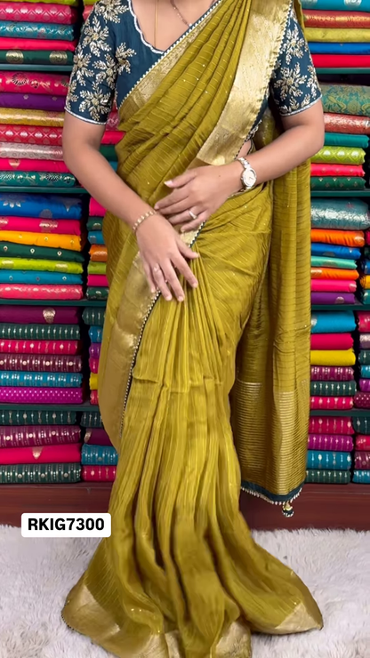 Mustard Yellow Crinkle-Textured Saree with Ornate Gold Zari Border and Embroidered Teal Blouse