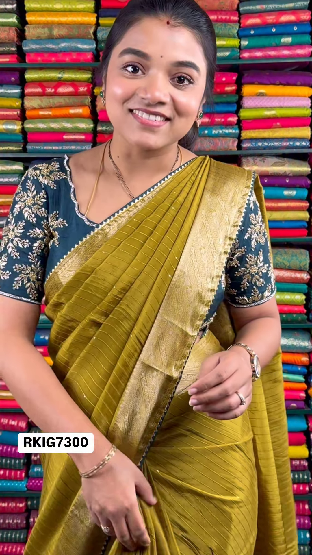 Mustard Yellow Crinkle-Textured Saree with Ornate Gold Zari Border and Embroidered Teal Blouse