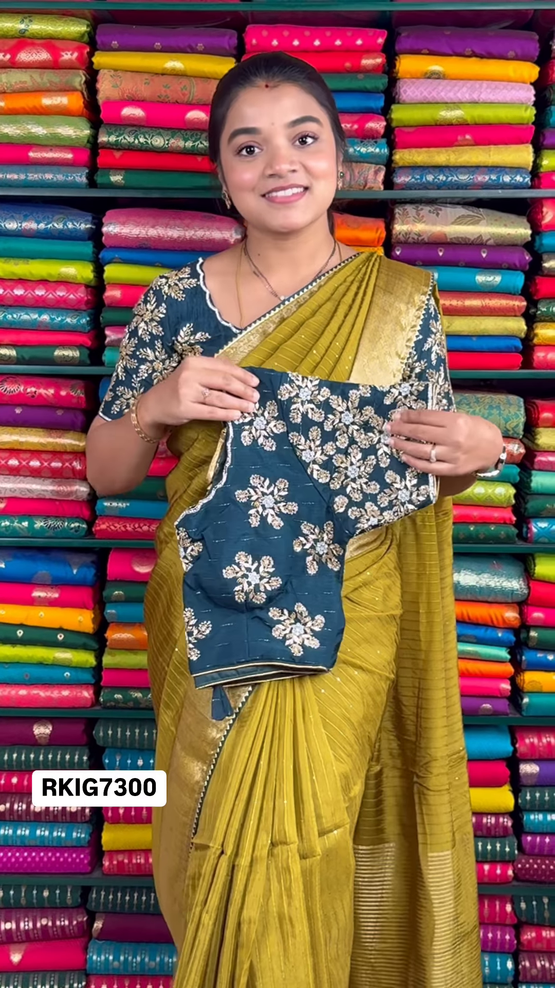 Mustard Yellow Crinkle-Textured Saree with Ornate Gold Zari Border and Embroidered Teal Blouse