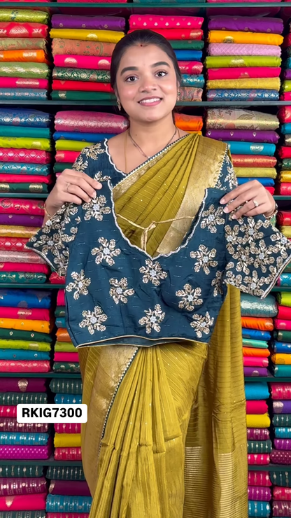 Mustard Yellow Crinkle-Textured Saree with Ornate Gold Zari Border and Embroidered Teal Blouse