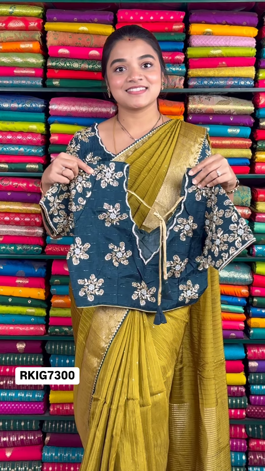 Mustard Yellow Crinkle-Textured Saree with Ornate Gold Zari Border and Embroidered Teal Blouse