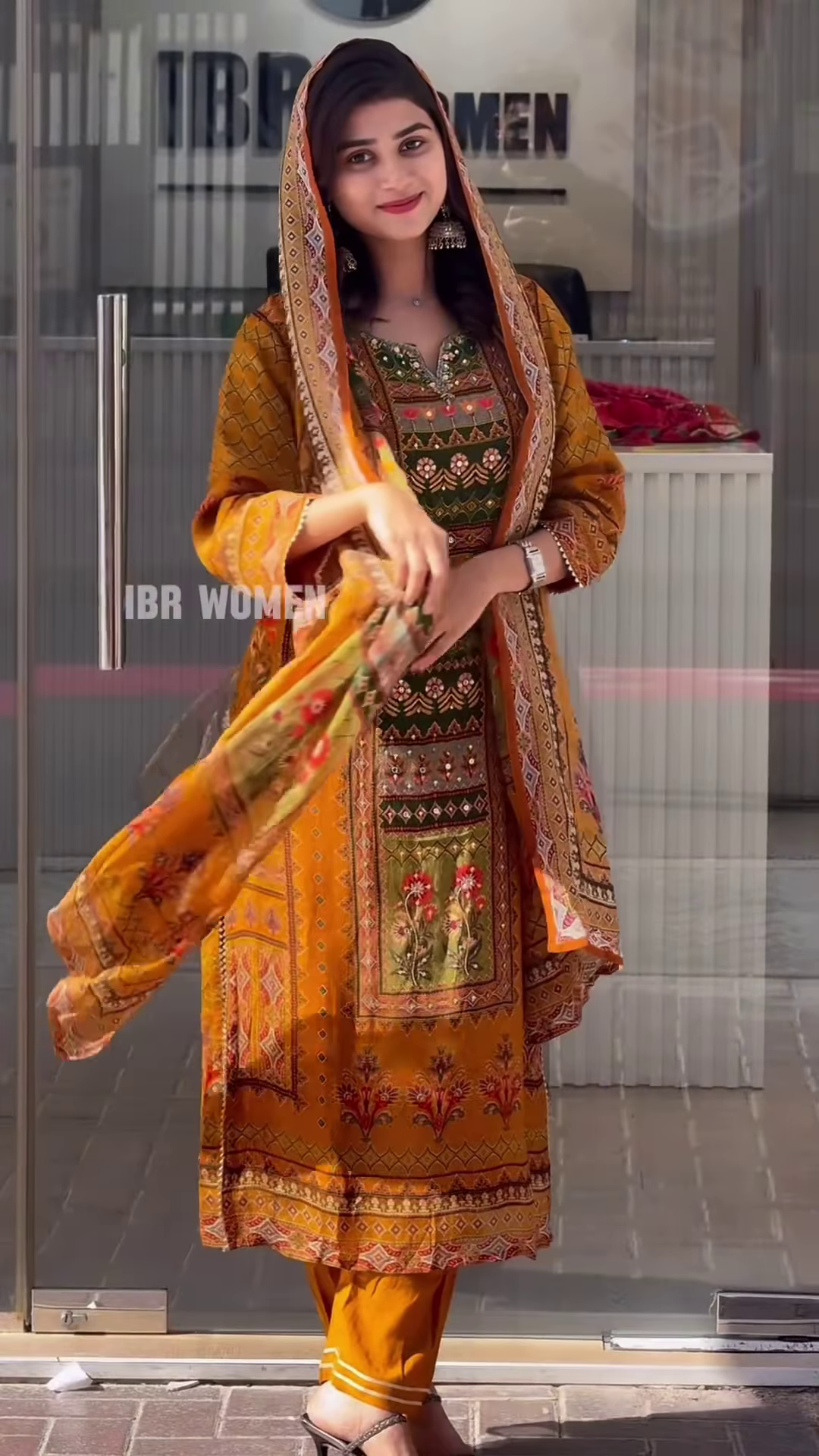 Traditional Mustard Orange Printed Salwar Suit with Kashmiri Floral Yoke and Hand-Placed Mirror Details